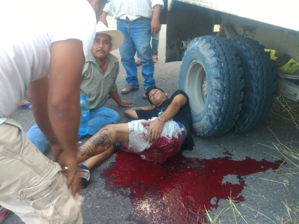 Asaltan y balacean a comerciantes en Espinal!!