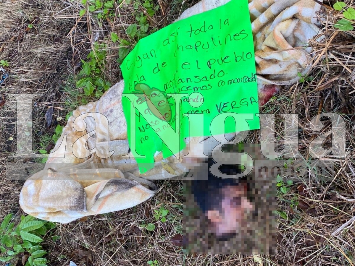 Identifican al dec@pitad0 en Yanga. lo acusan de robamotos en cartel dejado sobre sus rest0s