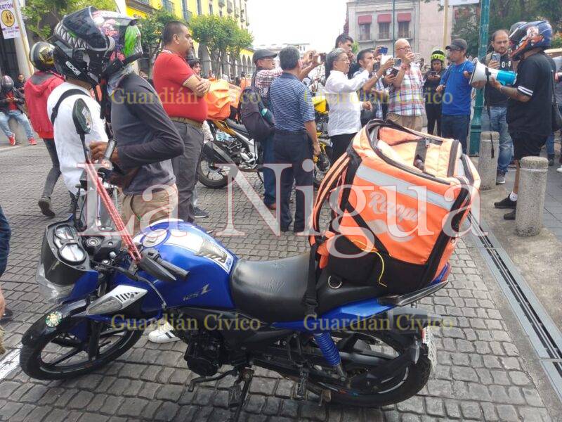 Repartidores se manifiestan por abusos por parte de policías